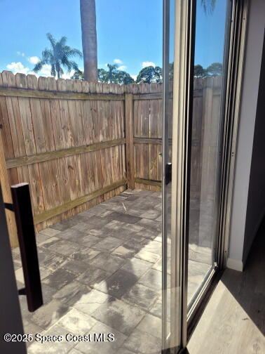 732 Ridge Club Drive, Unit 49 Melbourne, FL 32934 - Photo 18 of 20 a view of a balcony from door