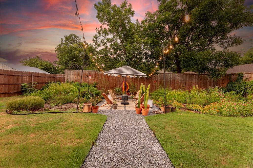 204 Main Street Haslet, TX 76052 - Photo 12 of 36 a view of a lake with houses