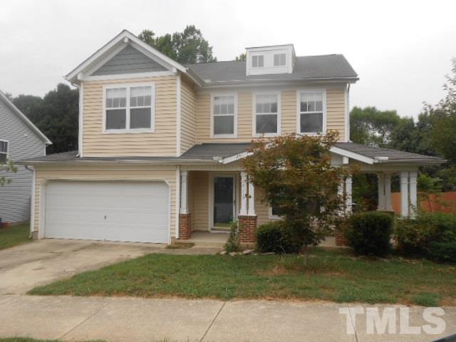 4113 Hopper Street Raleigh, NC 27616 - Photo 1 of 15 a front view of a house with garden