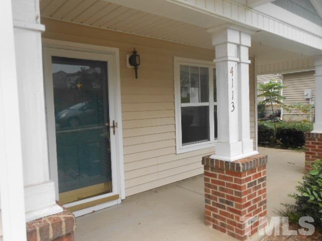4113 Hopper Street Raleigh, NC 27616 - Photo 15 of 15 front view of a house with a door