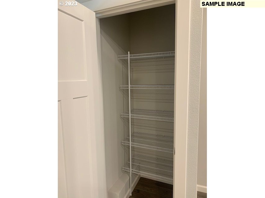 12011 Southeast High Creek Road, Unit C Happy Valley, OR 97086 - Photo 12 of 20 a room with a bench and a window