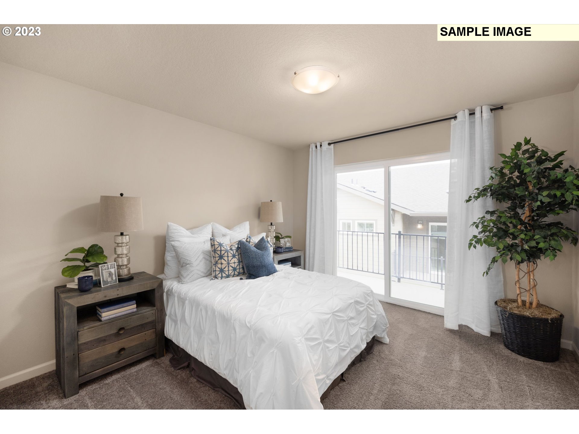 12011 Southeast High Creek Road, Unit C Happy Valley, OR 97086 - Photo 13 of 20 a bedroom with a bed potted plant with the view of window