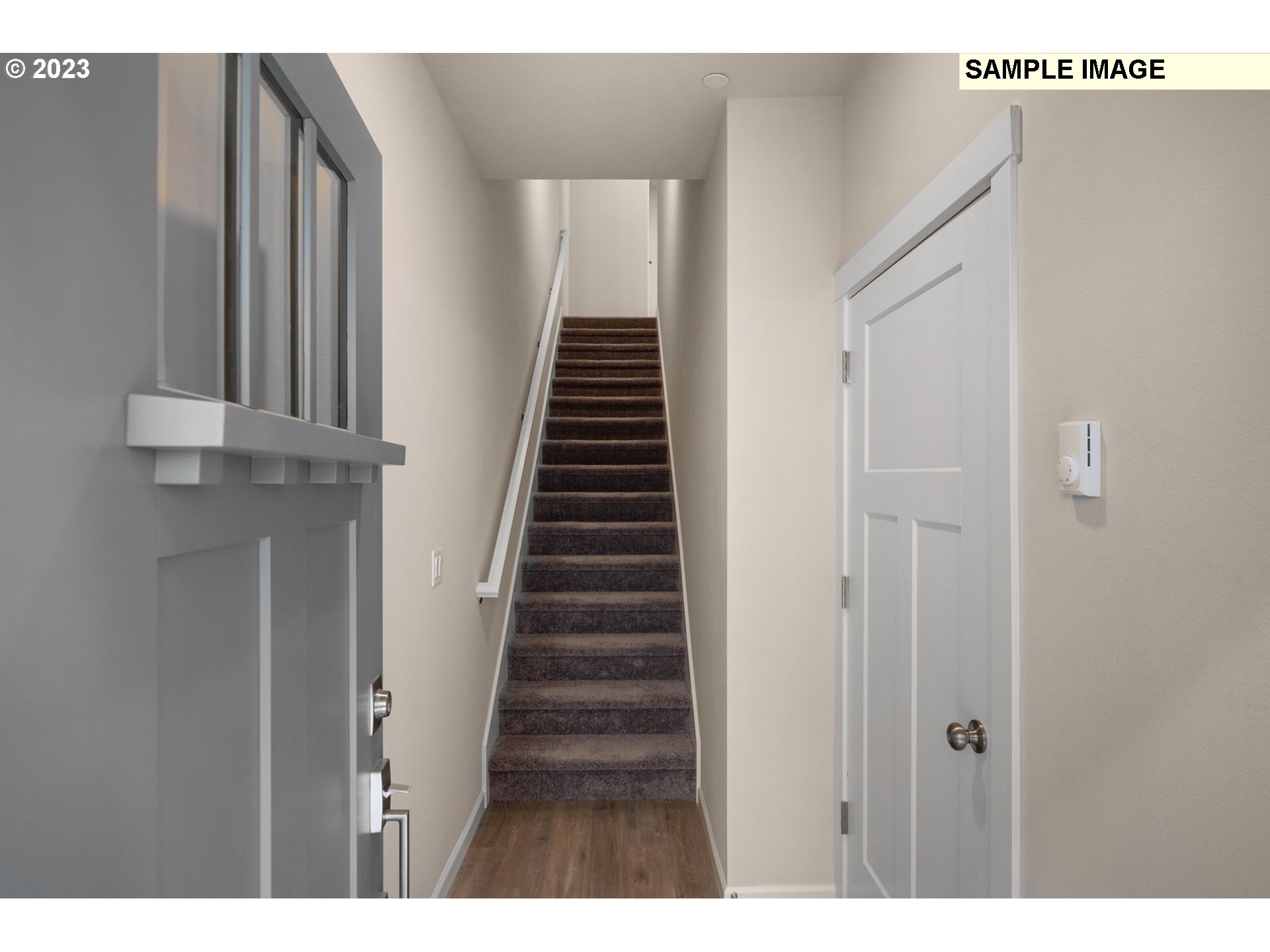 12011 Southeast High Creek Road, Unit C Happy Valley, OR 97086 - Photo 6 of 20 a view of an entryway with staircase