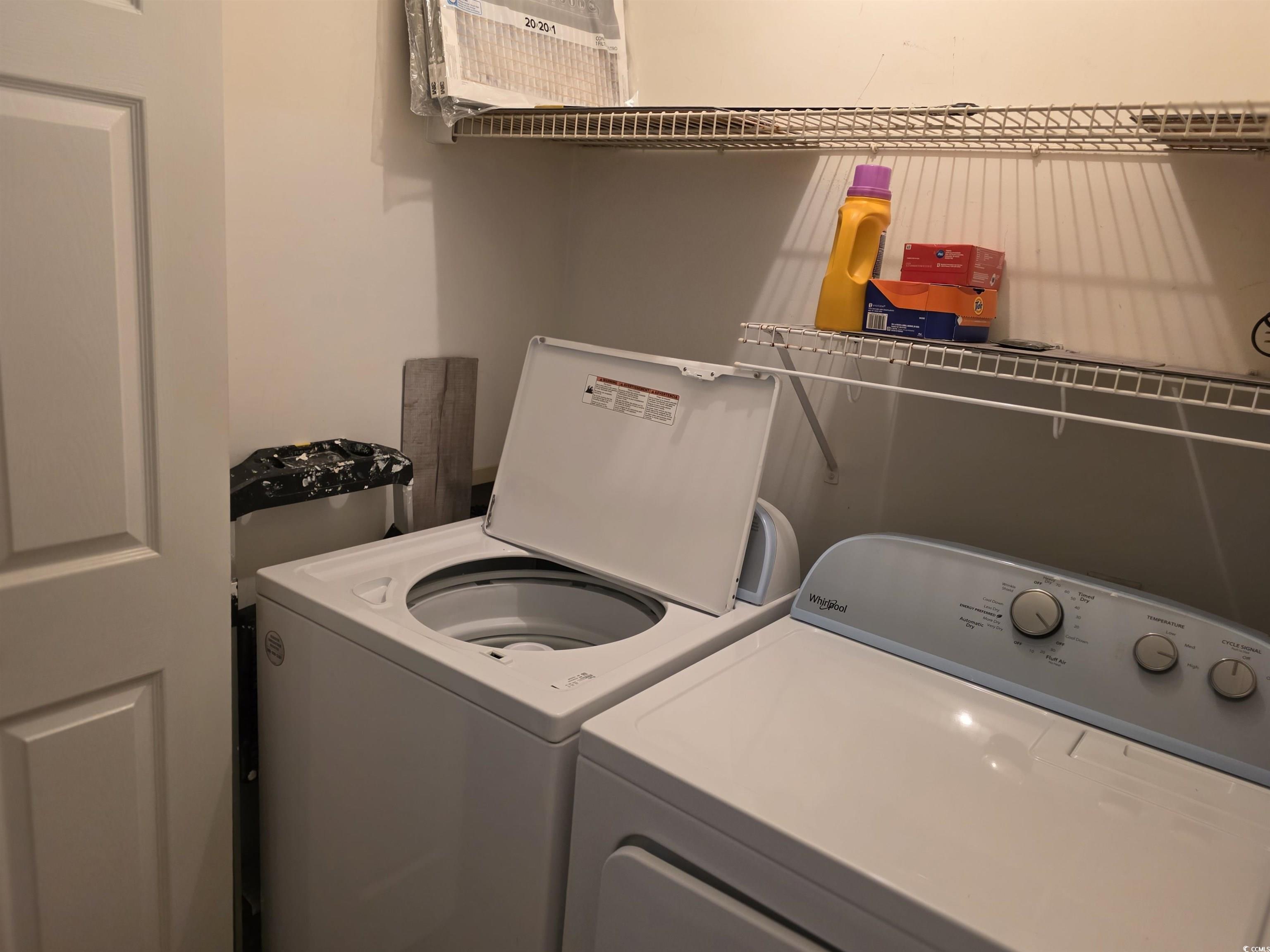 1637 Club Circle, Unit 18 Pawleys Island, SC 29585 - Photo 17 of 20 Washroom featuring separate washer and dryer