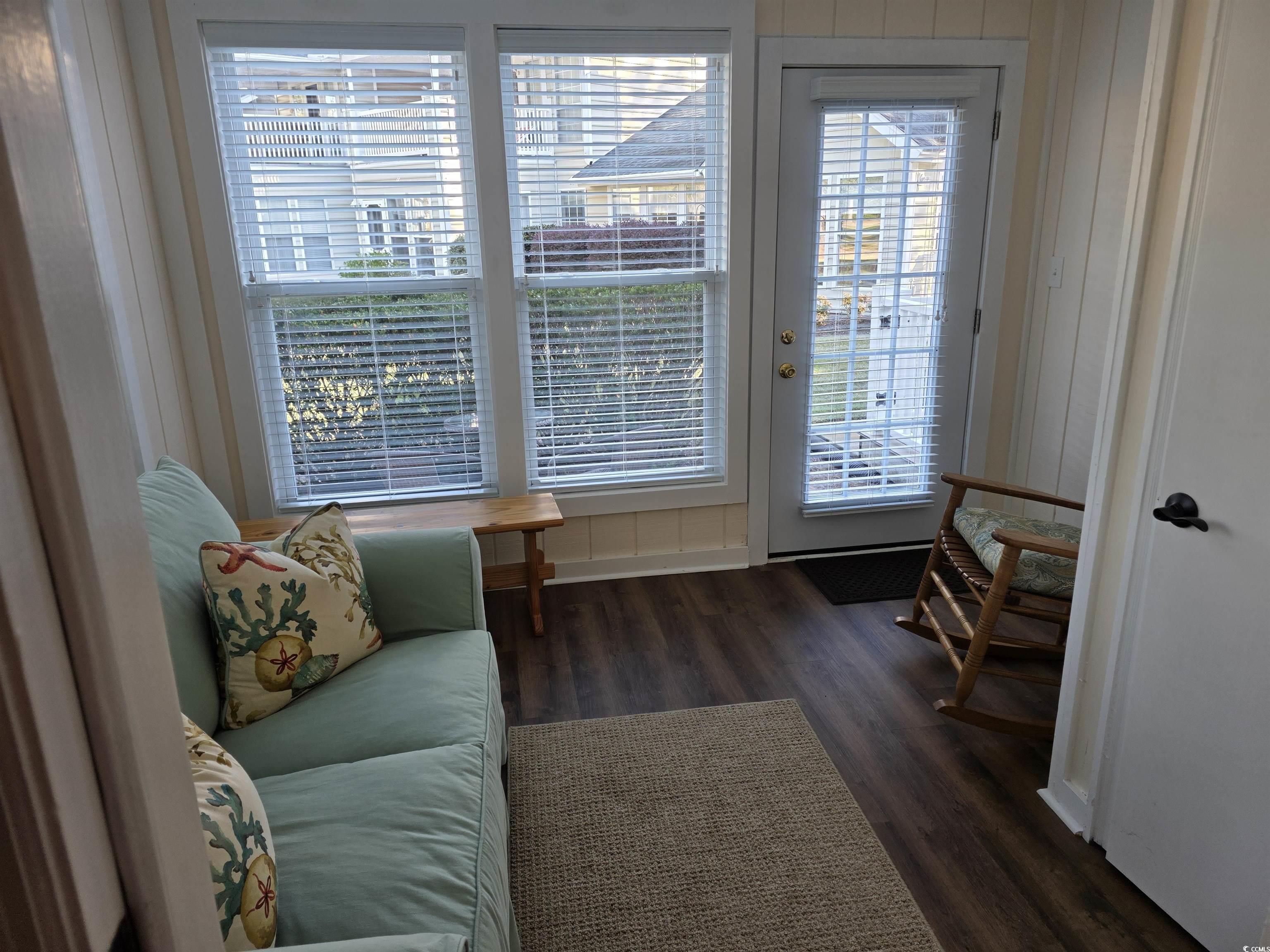 1637 Club Circle, Unit 18 Pawleys Island, SC 29585 - Photo 6 of 20 featuring wood finished floors and healthy amount of natural light