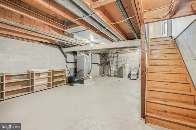 a view of an empty room with stairs