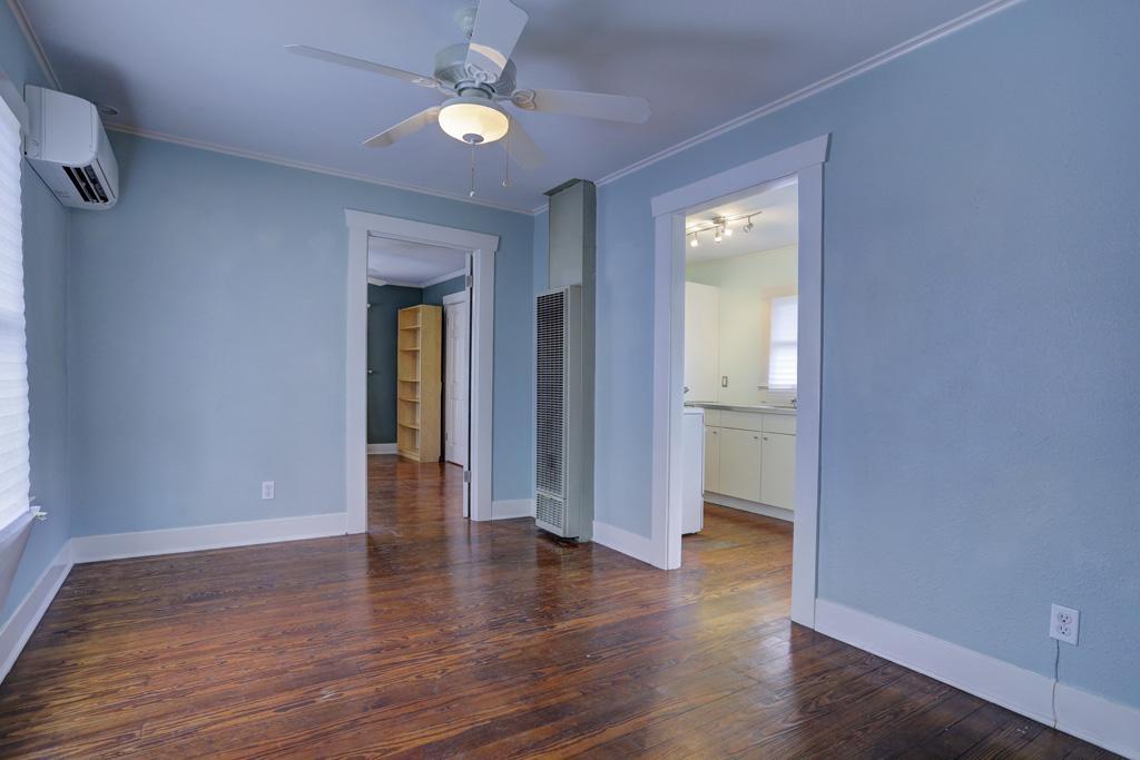 514 East 15th Street, Unit 2 Houston, TX 77008 - Photo 6 of 9 wooden floor in an empty room with a window