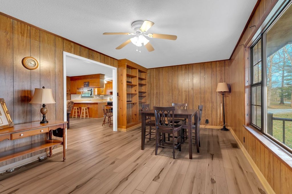 251 Bell Road Monteagle, TN 37356 - Photo 18 of 45 a view of a a dining room with furniture window and wooden floor
