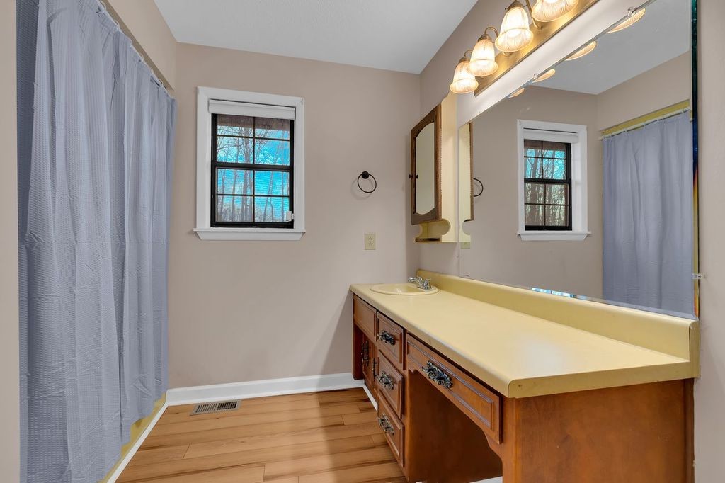 251 Bell Road Monteagle, TN 37356 - Photo 26 of 45 a room with a wooden floor and window