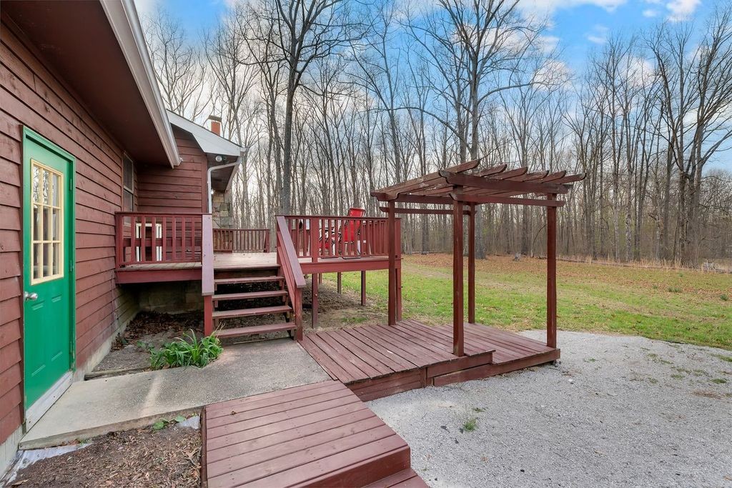 251 Bell Road Monteagle, TN 37356 - Photo 30 of 45 a front view of a house with garden