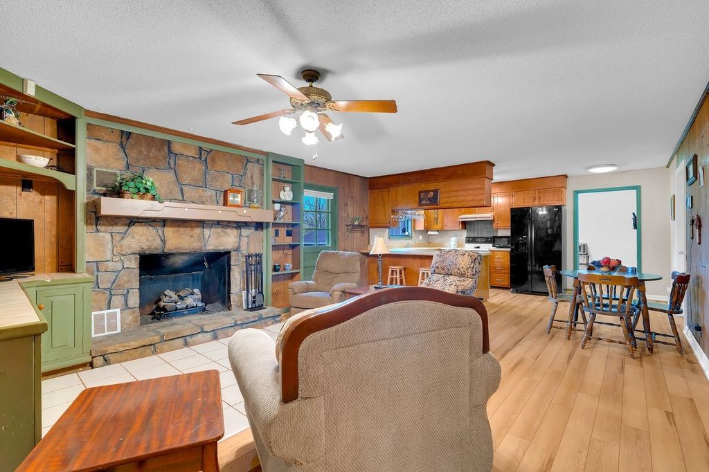 251 Bell Road Monteagle, TN 37356 - Photo 10 of 45 a living room with furniture and a fireplace