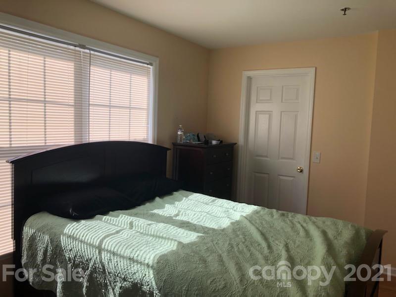 55 Derby Road, Unit 2D Cullowhee, NC 28723 - Photo 4 of 5 a bedroom with a bed and window