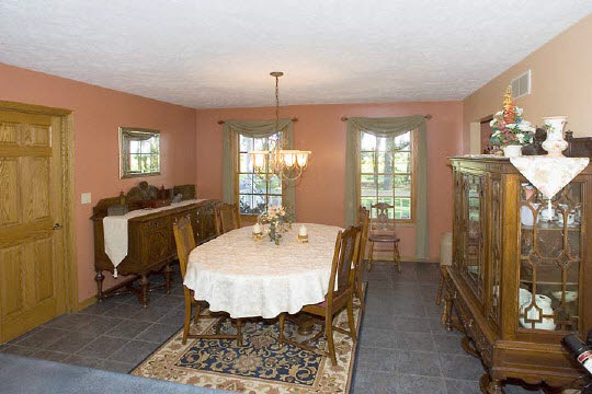 18108 Poplar Grove Road Poplar Grove, IL 61065 - Photo 4 of 7 a view of a dining room with furniture