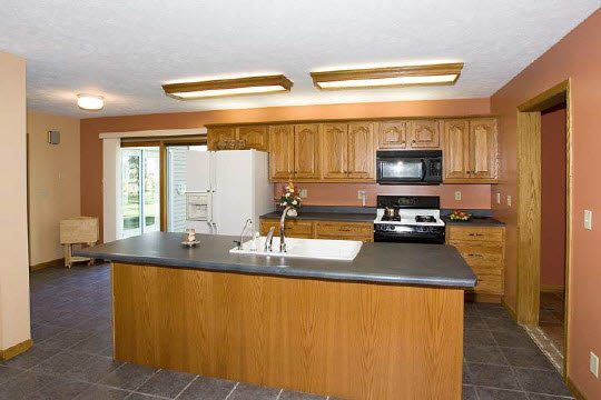 18108 Poplar Grove Road Poplar Grove, IL 61065 - Photo 5 of 7 a kitchen with sink a window and appliances