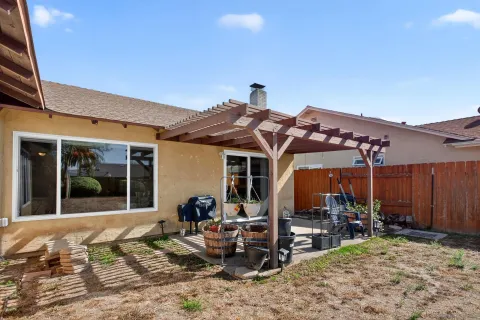 a view of a house with patio porch and sitting area