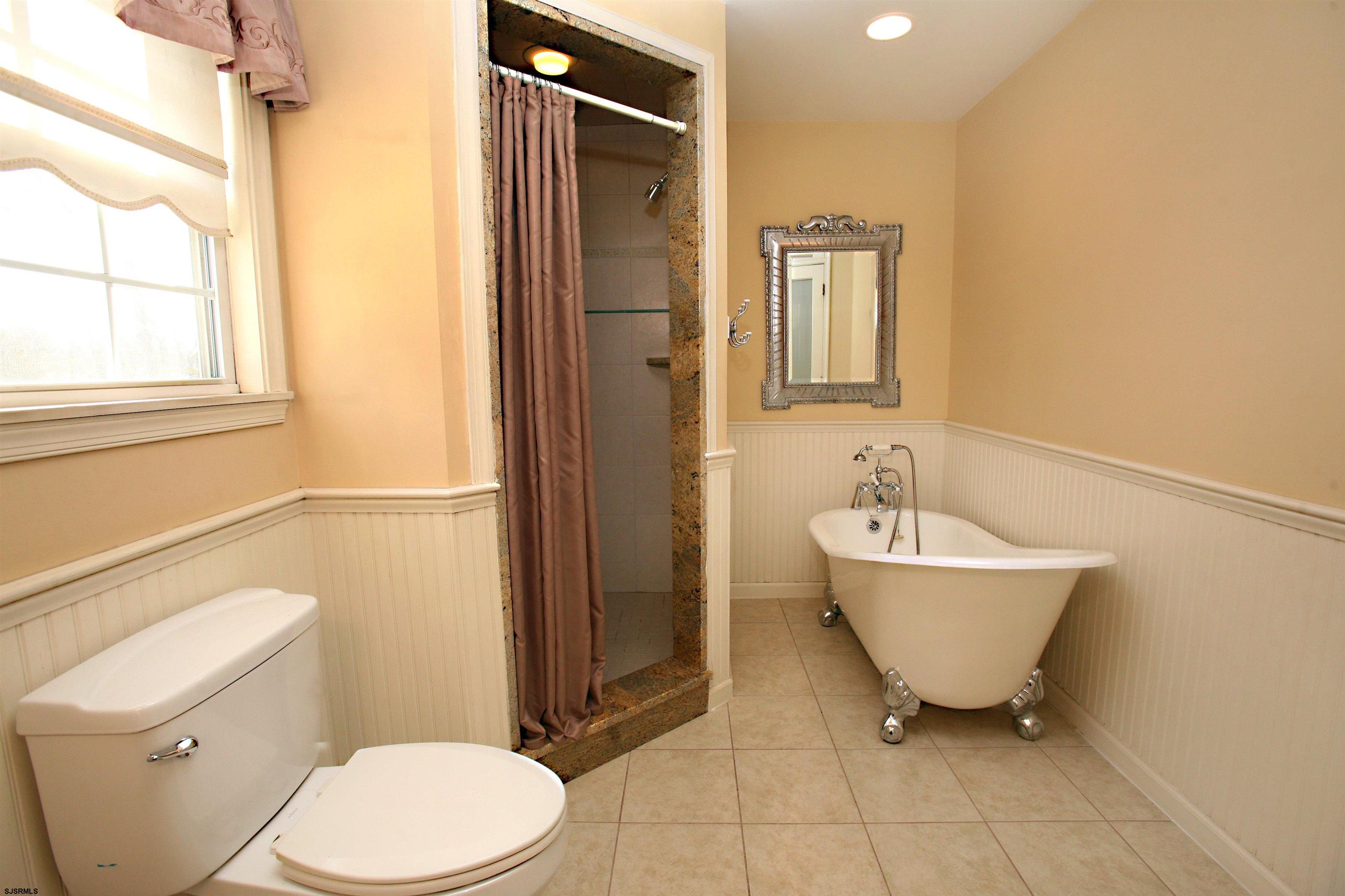 556 Grape Street Hammonton, NJ 08037 - Photo 14 of 26 a bathroom with a sink toilet and shower
