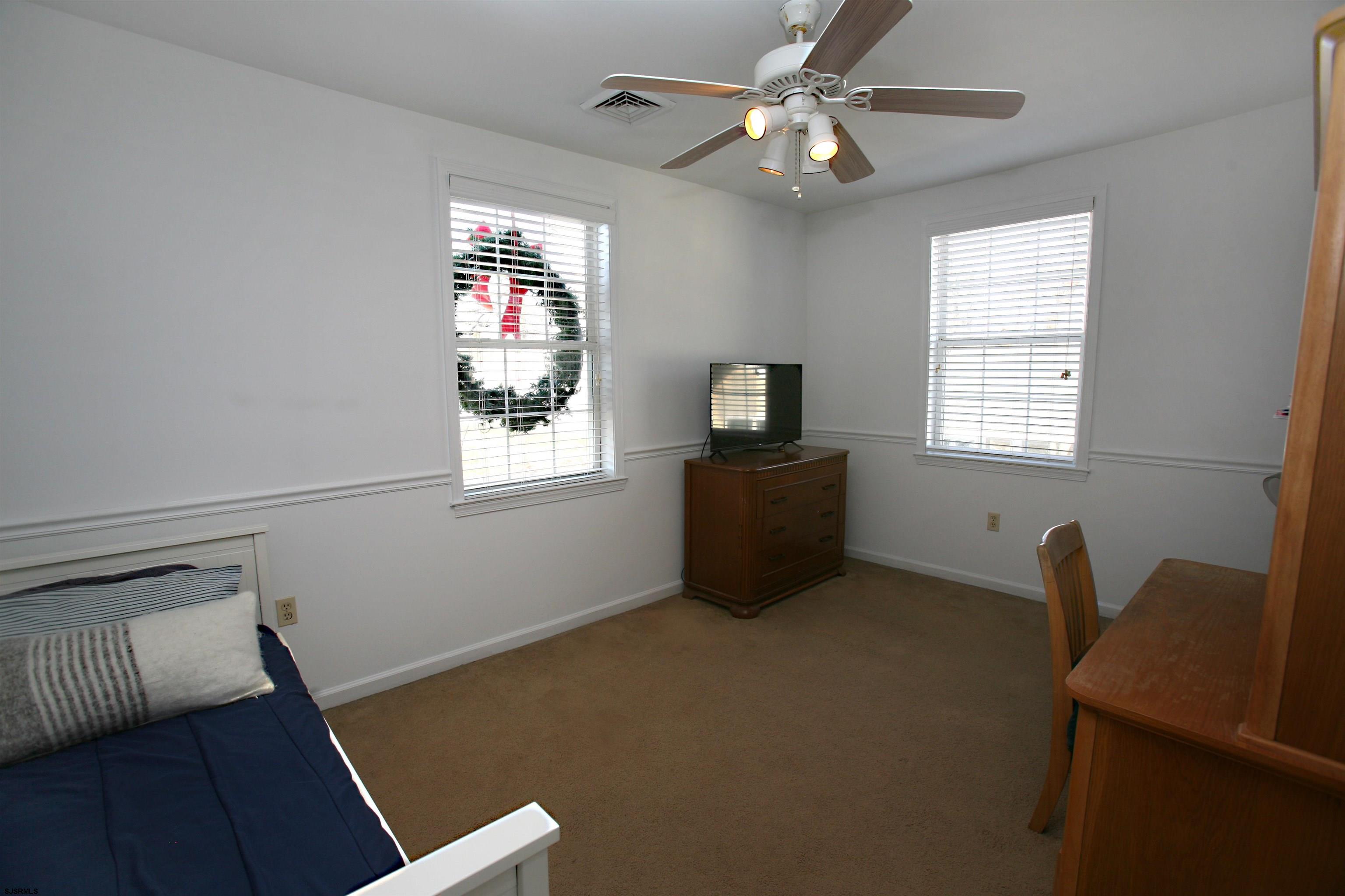 556 Grape Street Hammonton, NJ 08037 - Photo 19 of 26 a view of workspace with window and ceiling fan