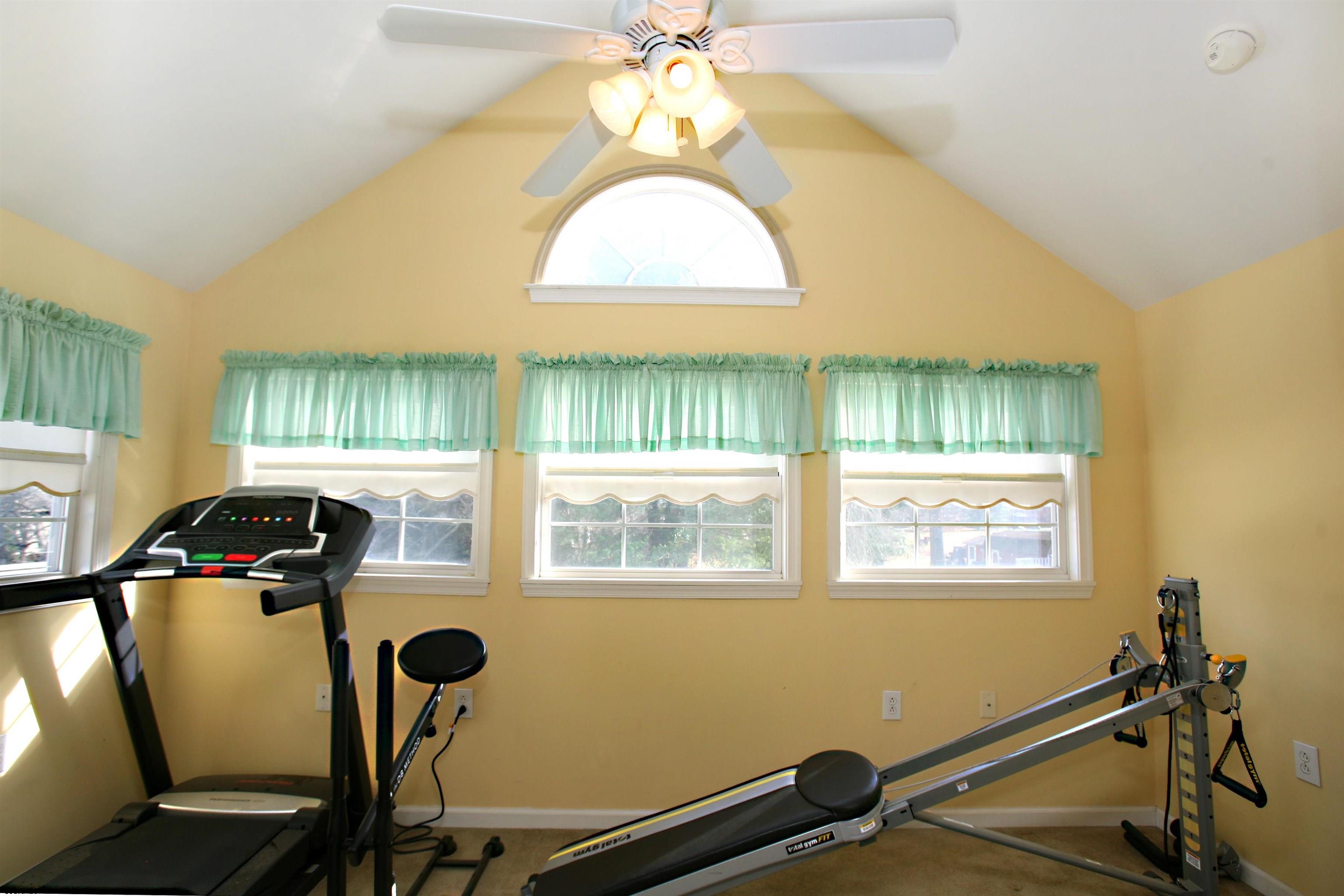 556 Grape Street Hammonton, NJ 08037 - Photo 22 of 26 a room with gym equipment and a window