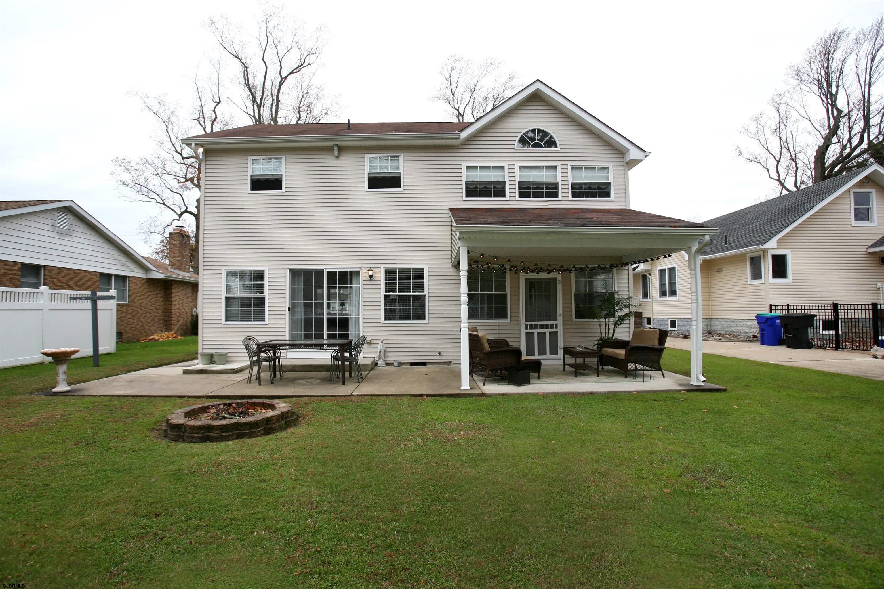 556 Grape Street Hammonton, NJ 08037 - Photo 25 of 26 a front view of a house with patio and yard