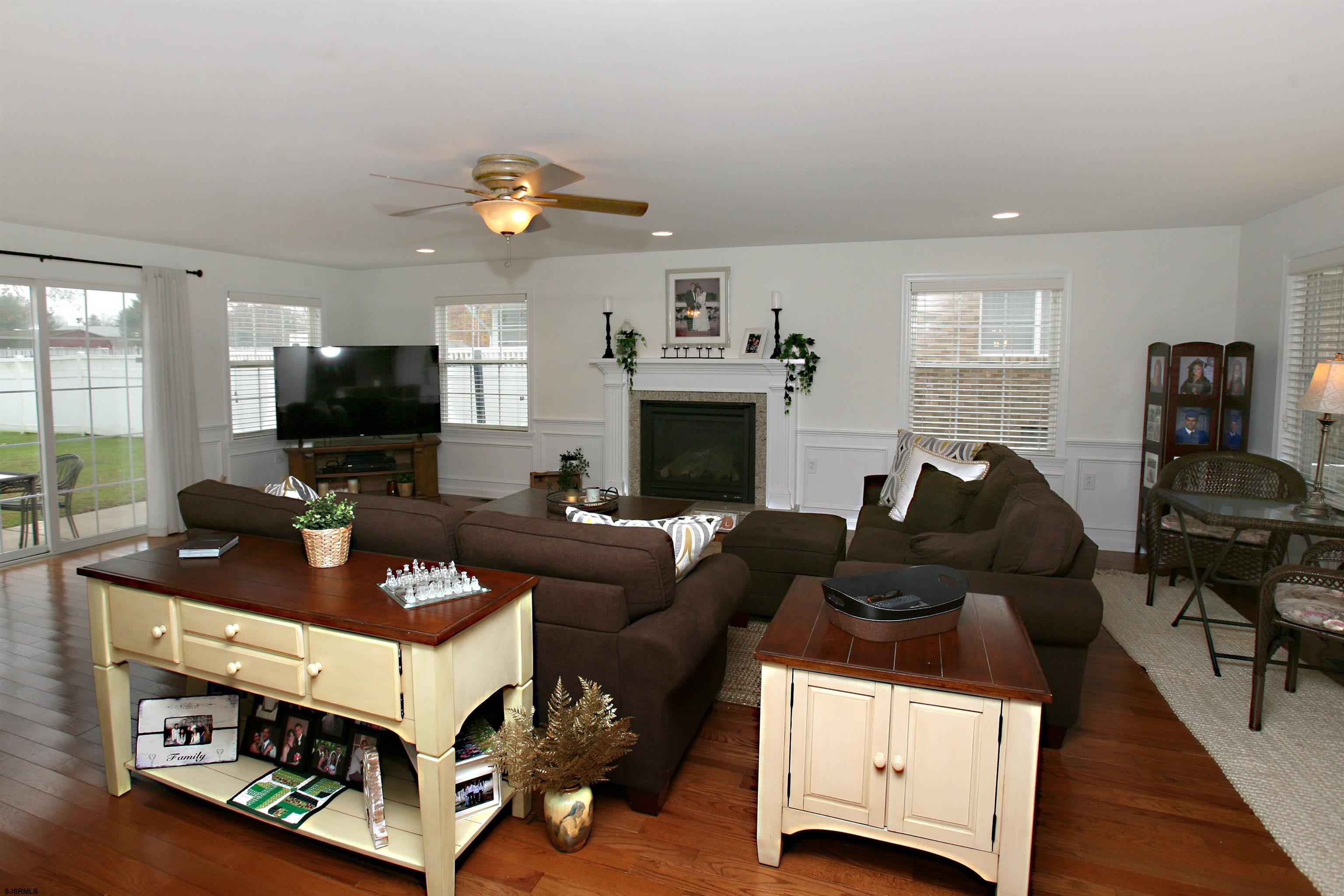 556 Grape Street Hammonton, NJ 08037 - Photo 8 of 26 a living room with furniture and a flat screen tv