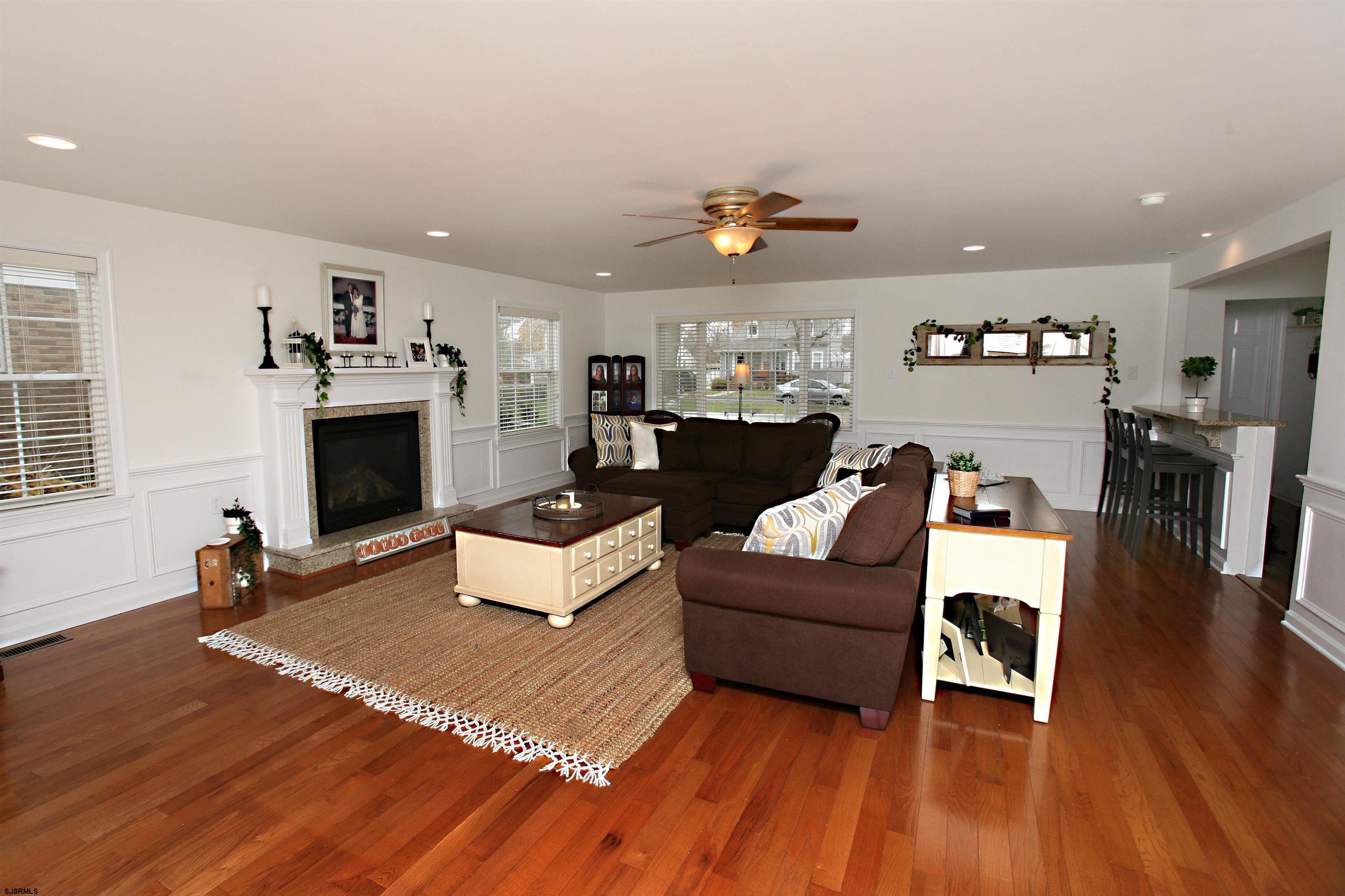 556 Grape Street Hammonton, NJ 08037 - Photo 9 of 26 a living room with furniture and a fireplace