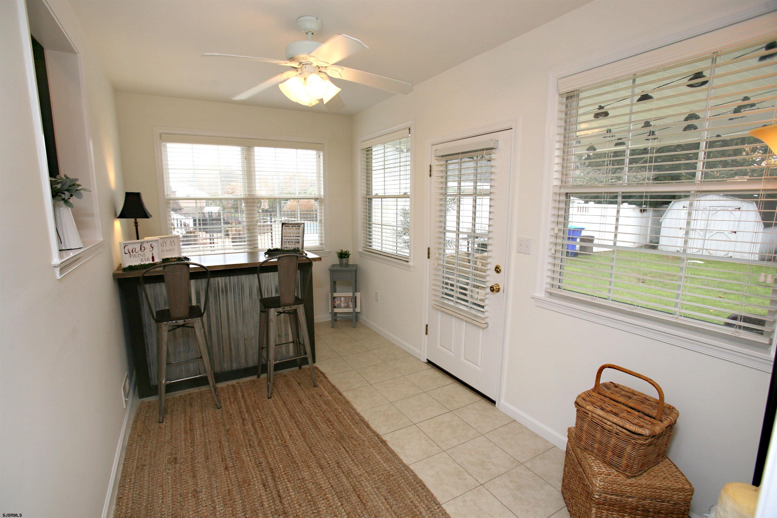 556 Grape Street Hammonton, NJ 08037 - Photo 10 of 26 a view of a livingroom with furniture window and wooden floor