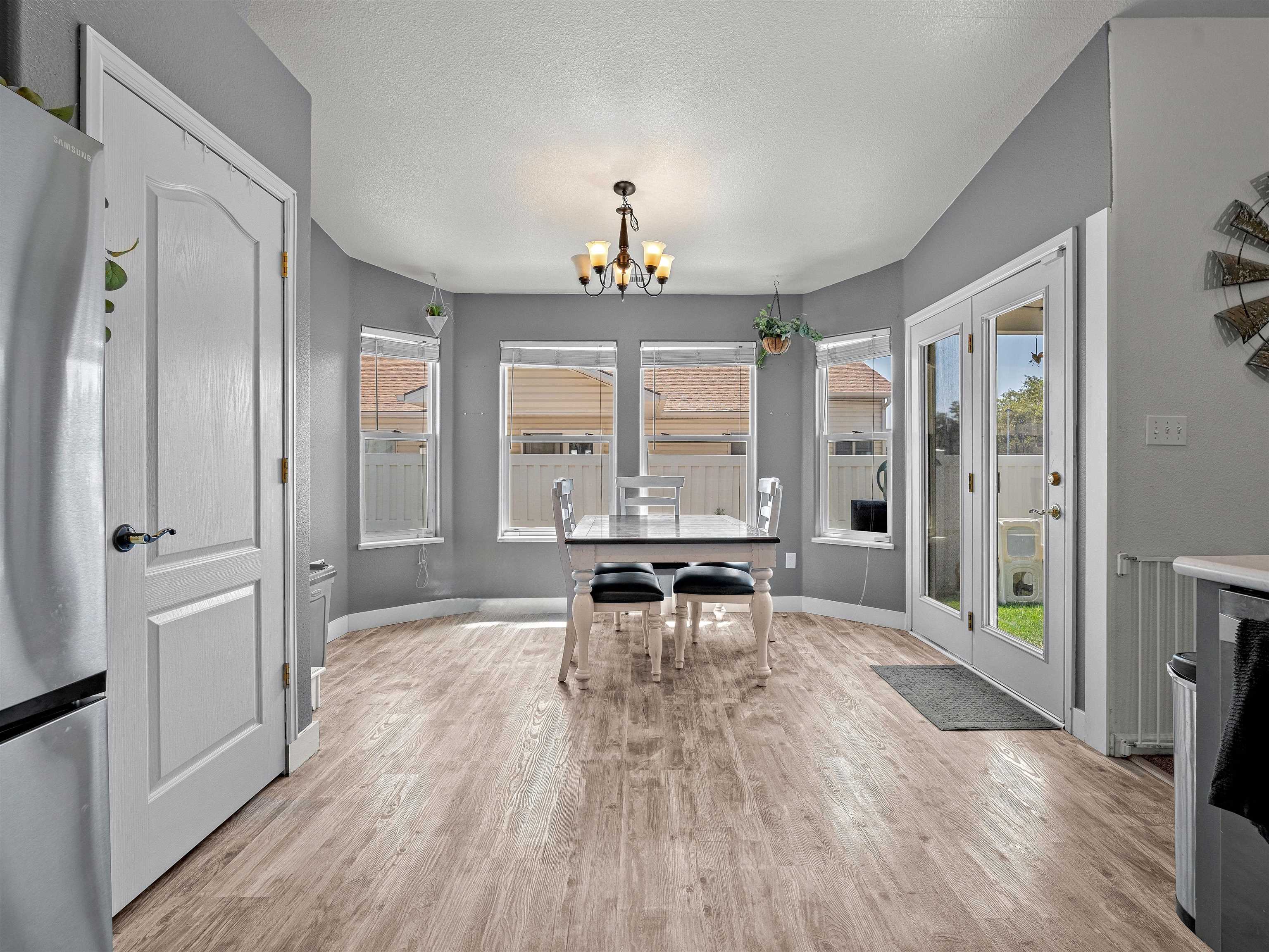 680 Stone Mountain Drive Fruita, CO 81521 - Photo 15 of 32 a view of a livingroom with furniture window and wooden floor