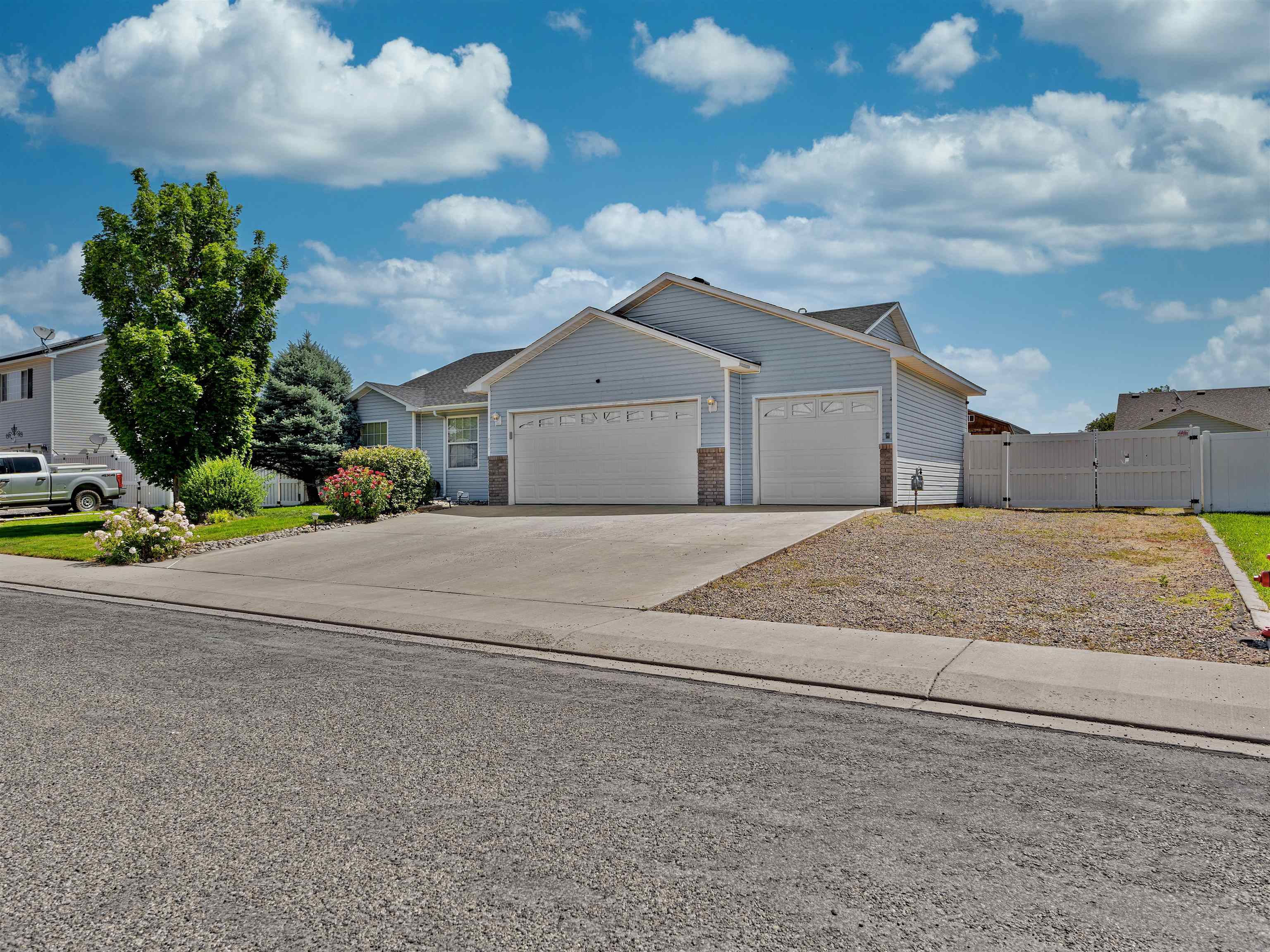 680 Stone Mountain Drive Fruita, CO 81521 - Photo 31 of 32 a view of house with a street