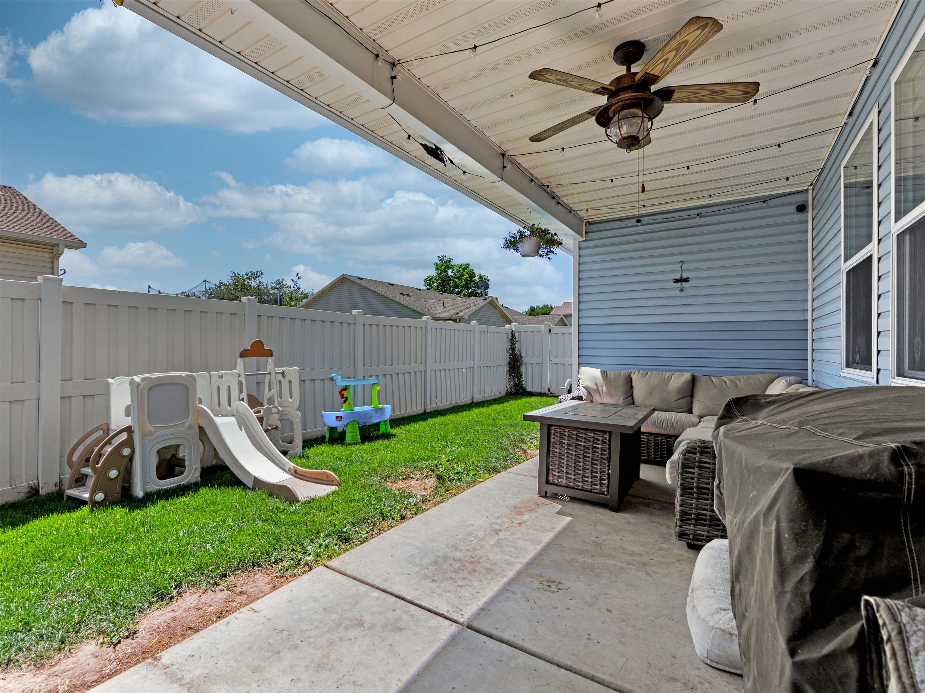 680 Stone Mountain Drive Fruita, CO 81521 - Photo 9 of 32 a view of a porch with furniture and garden