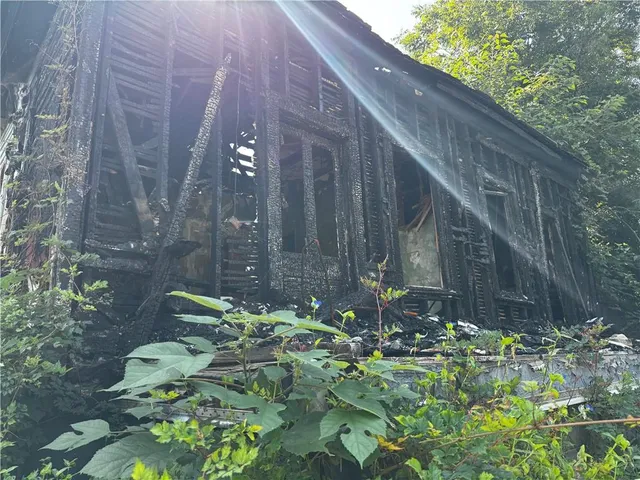 a garden view with a seating space