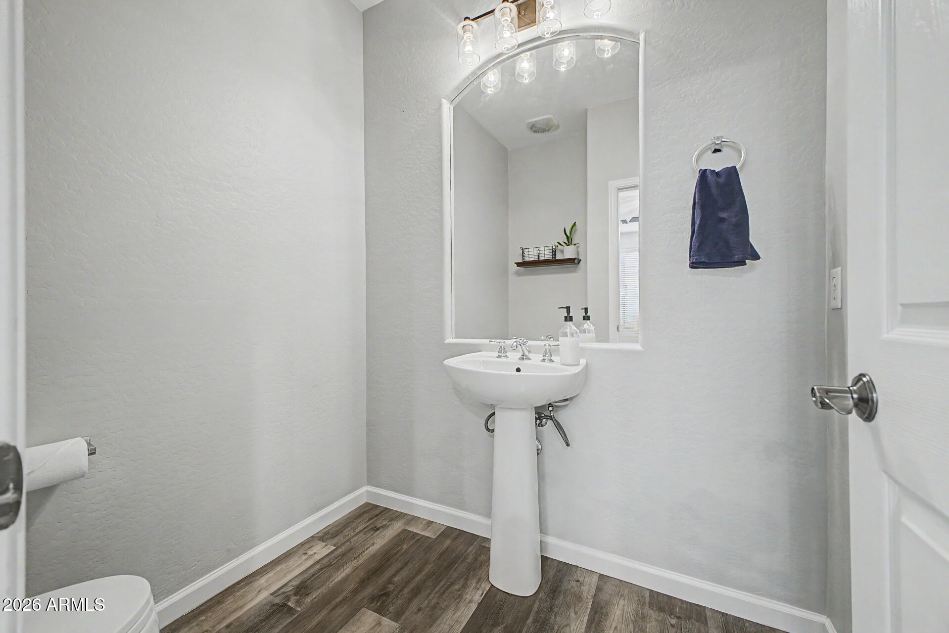 4331 East Cullumber Street Gilbert, AZ 85234 - Photo 15 of 42 a bathroom with a sink and mirror