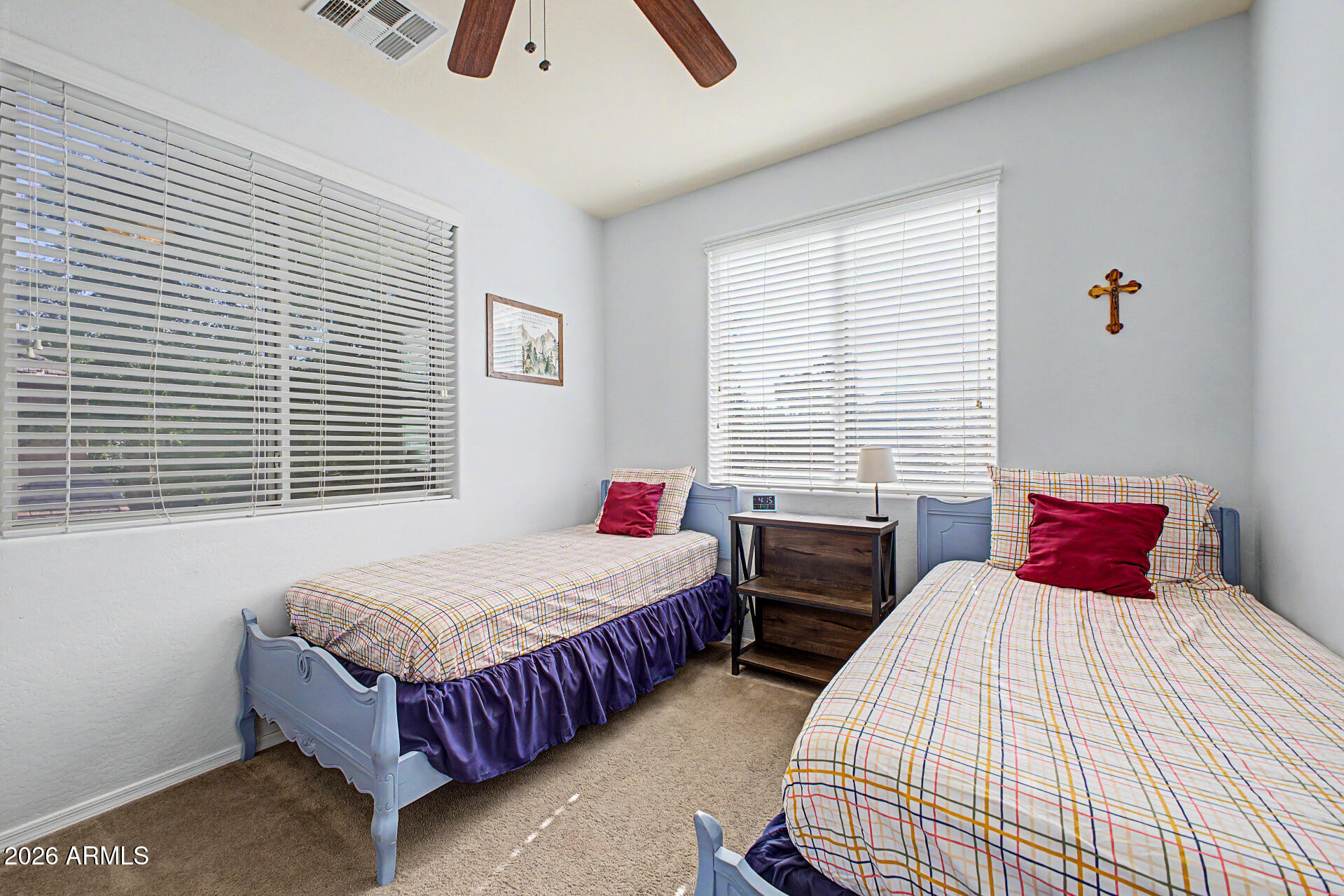 4331 East Cullumber Street Gilbert, AZ 85234 - Photo 19 of 42 a bedroom with bed and windows