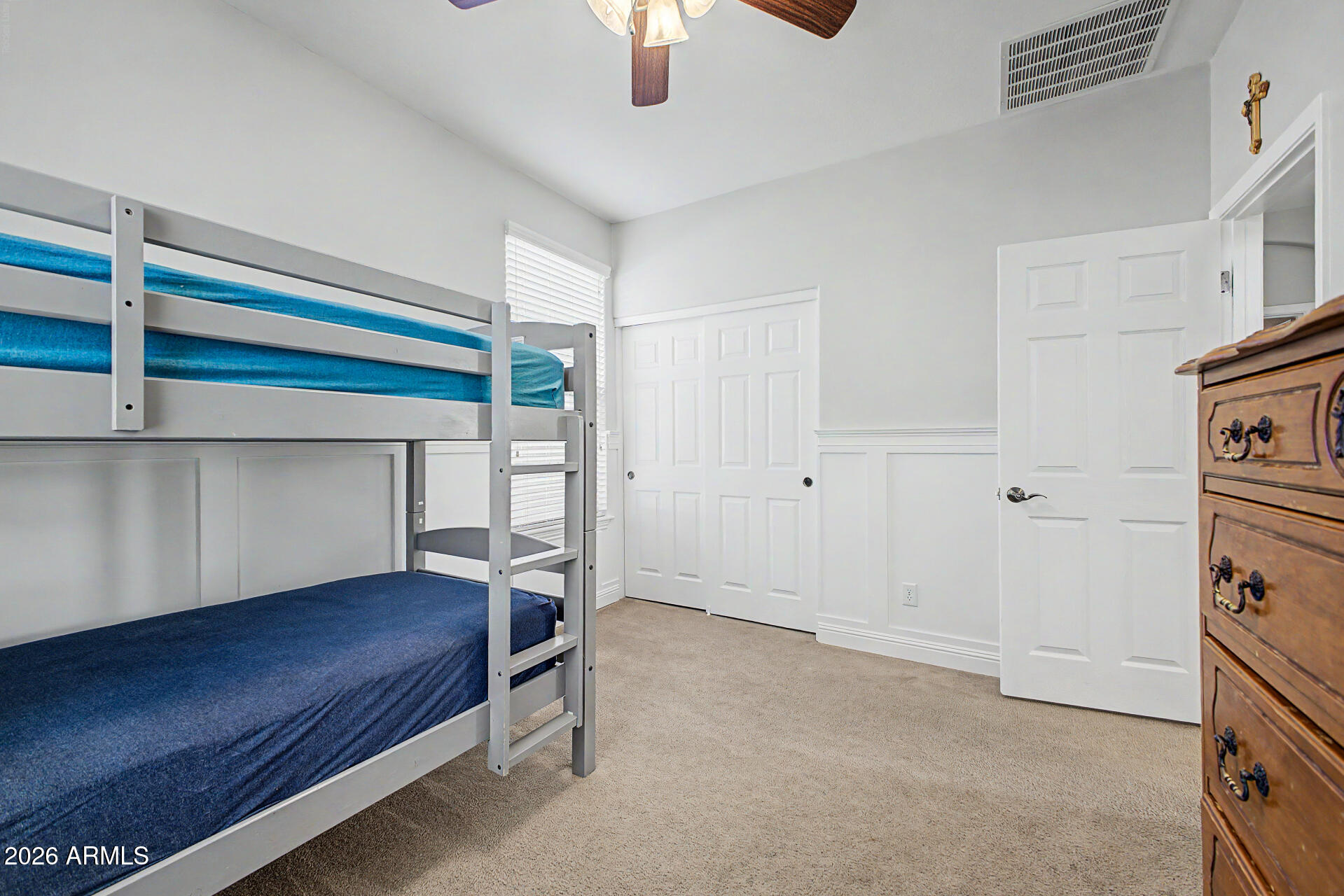 4331 East Cullumber Street Gilbert, AZ 85234 - Photo 22 of 42 a room with a bed and a ceiling fan