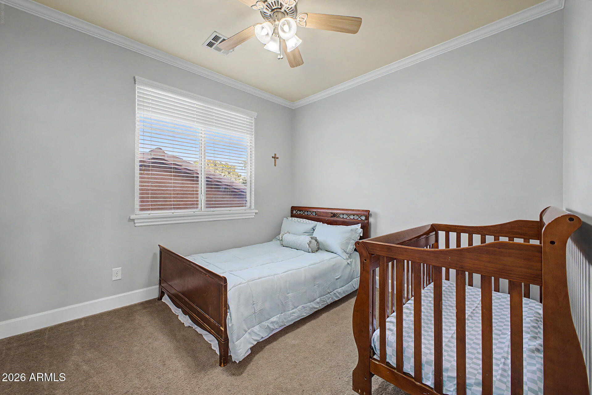 4331 East Cullumber Street Gilbert, AZ 85234 - Photo 24 of 42 a bedroom with bed and a window