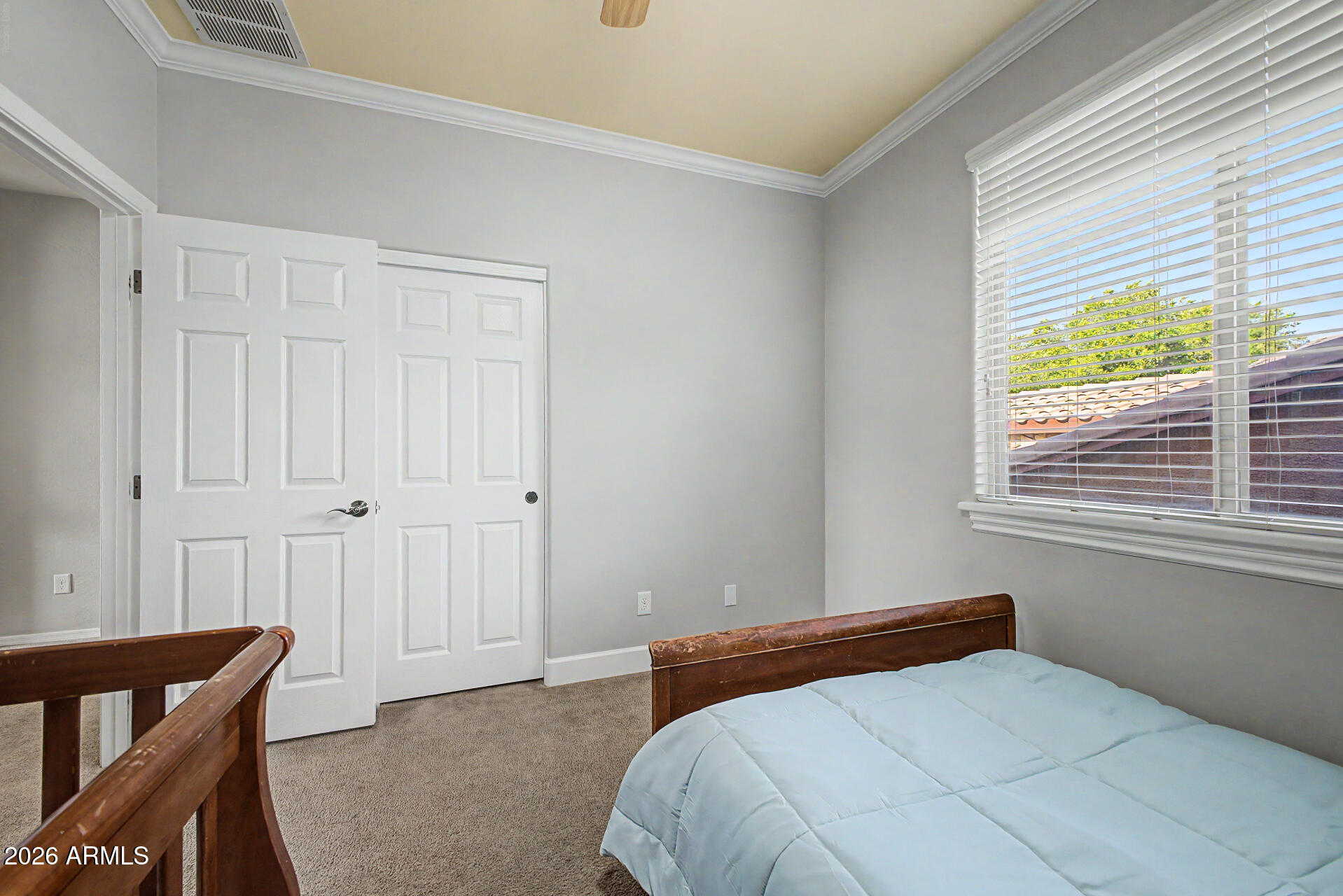 4331 East Cullumber Street Gilbert, AZ 85234 - Photo 25 of 42 a bedroom with a bed and a window
