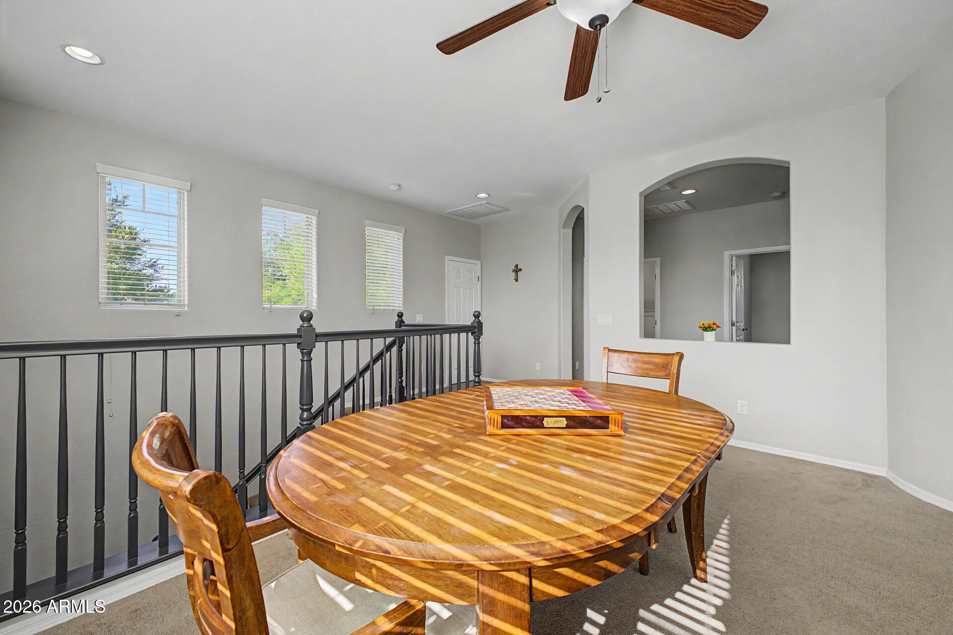 4331 East Cullumber Street Gilbert, AZ 85234 - Photo 28 of 42 a dining room with a table and chairs