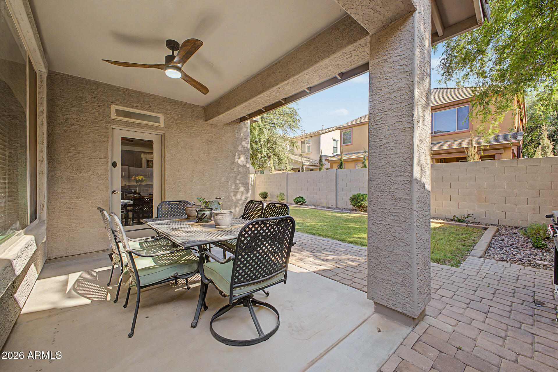 4331 East Cullumber Street Gilbert, AZ 85234 - Photo 30 of 42 a view of a porch with furniture and a yard