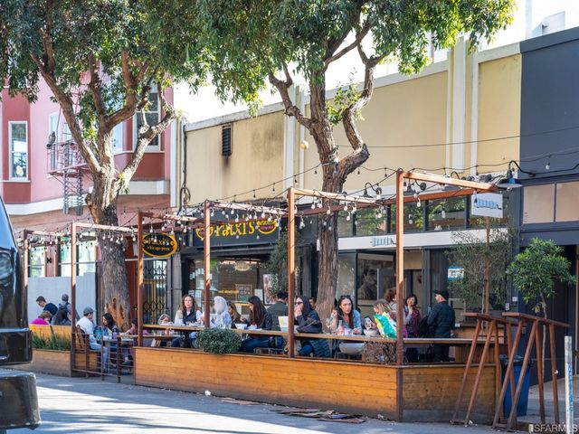 a street sign on a pole on a street