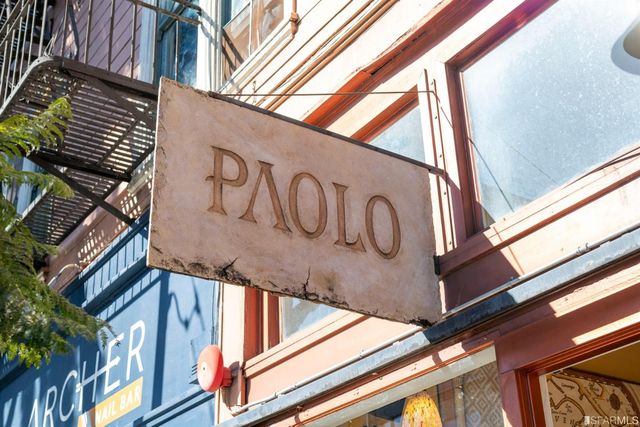 a view of a street with cars