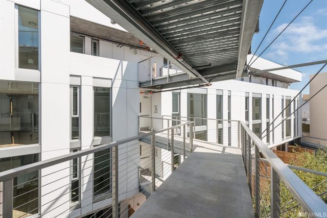 a view of kitchen with livingroom and furniture