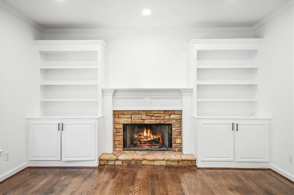 1710 Rising Mist Lane Cumming, GA 30041 - Photo 23 of 111 a view of an empty room with a fireplace and a window