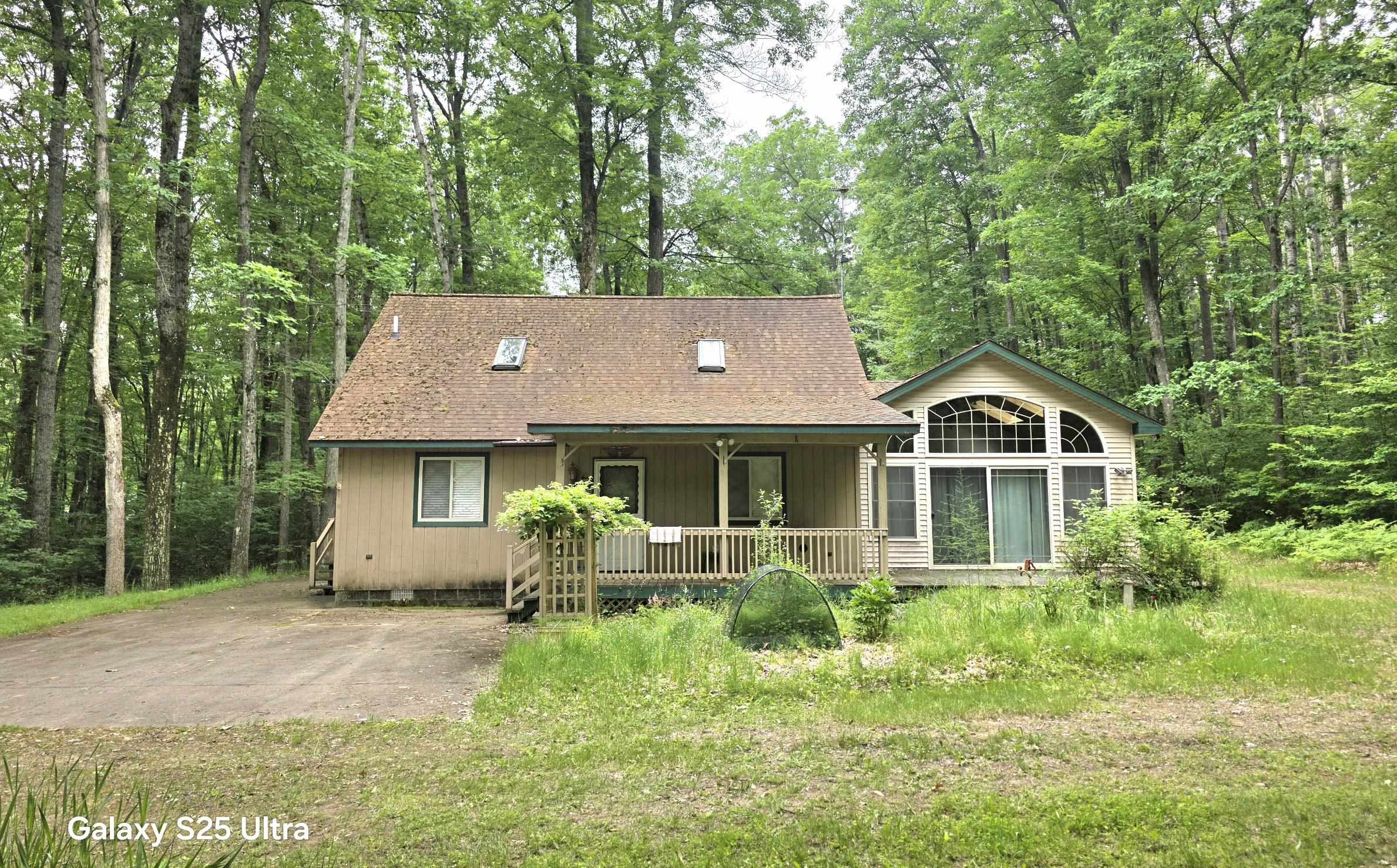 10135 Woods Road Gladwin, MI 48624 - Photo 1 of 54