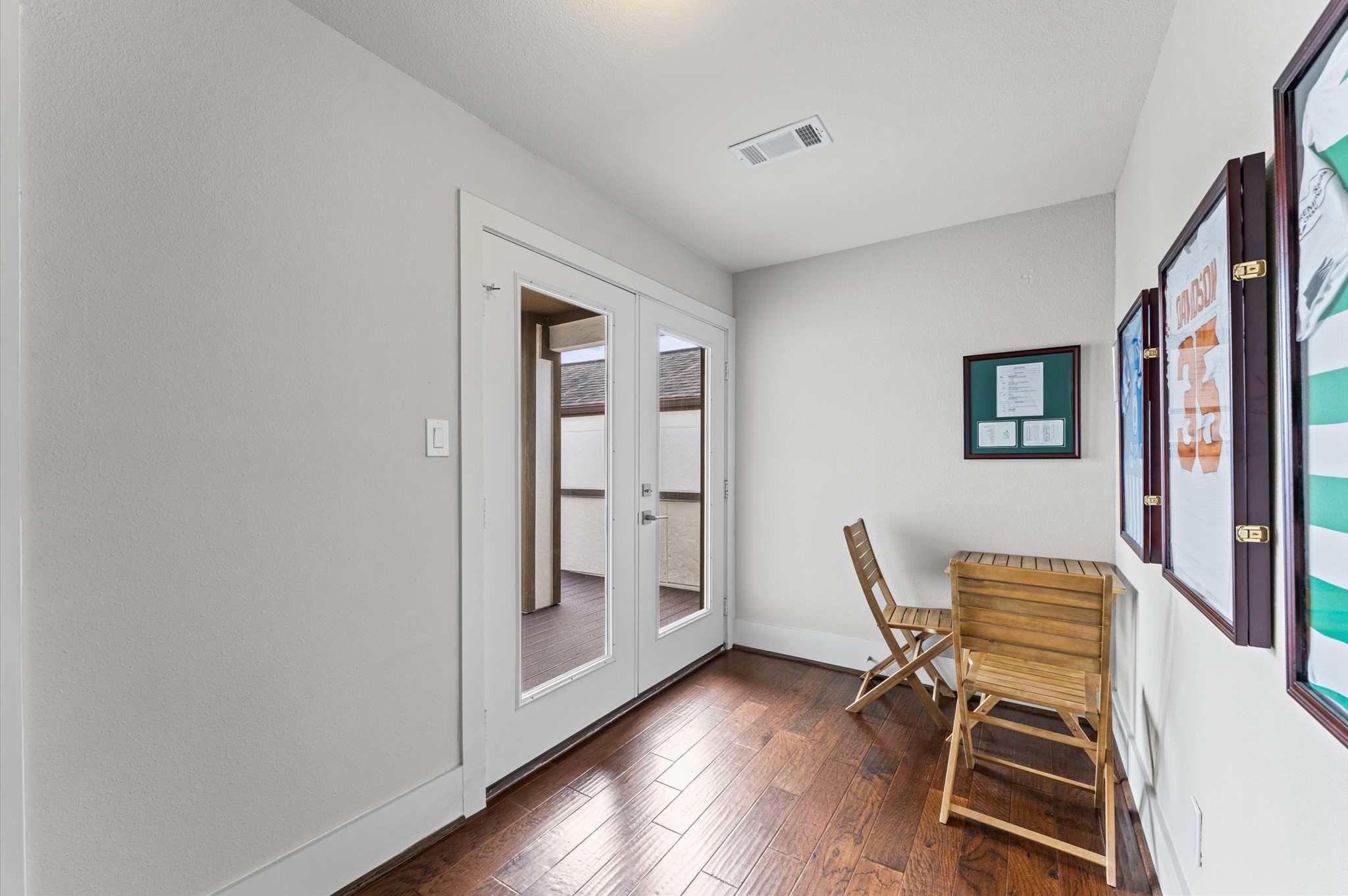 910 West 18th Street, Unit B Houston, TX 77008 - Photo 21 of 28 4th floor features a flex space, roof patio, and an unfinished attic space that provides plenty of storage, and a conversion opportunity to add another room.