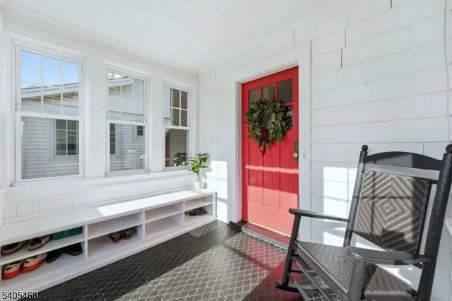 a spacious bedroom with a bed and a window