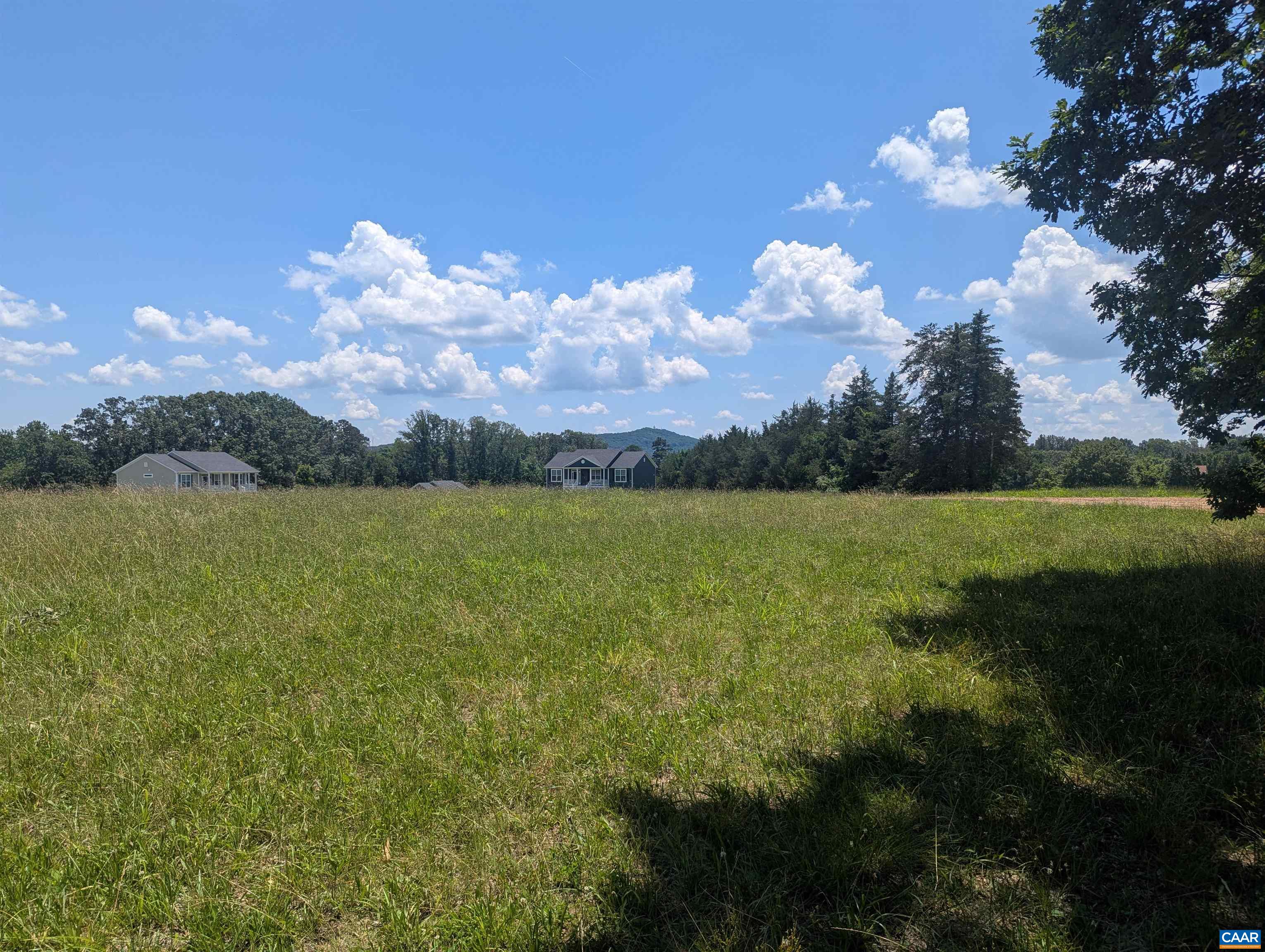 Lot 7 Advance Mills Road Ruckersville, VA 22968 - Photo 12 of 26 a view of a lake with a city