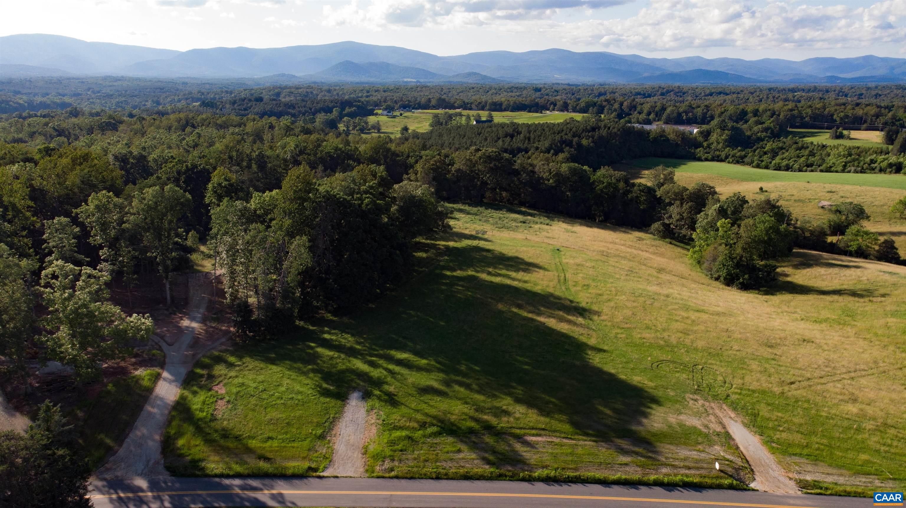 Lot 7 Advance Mills Road Ruckersville, VA 22968 - Photo 17 of 26 a view of a city with mountains in the background
