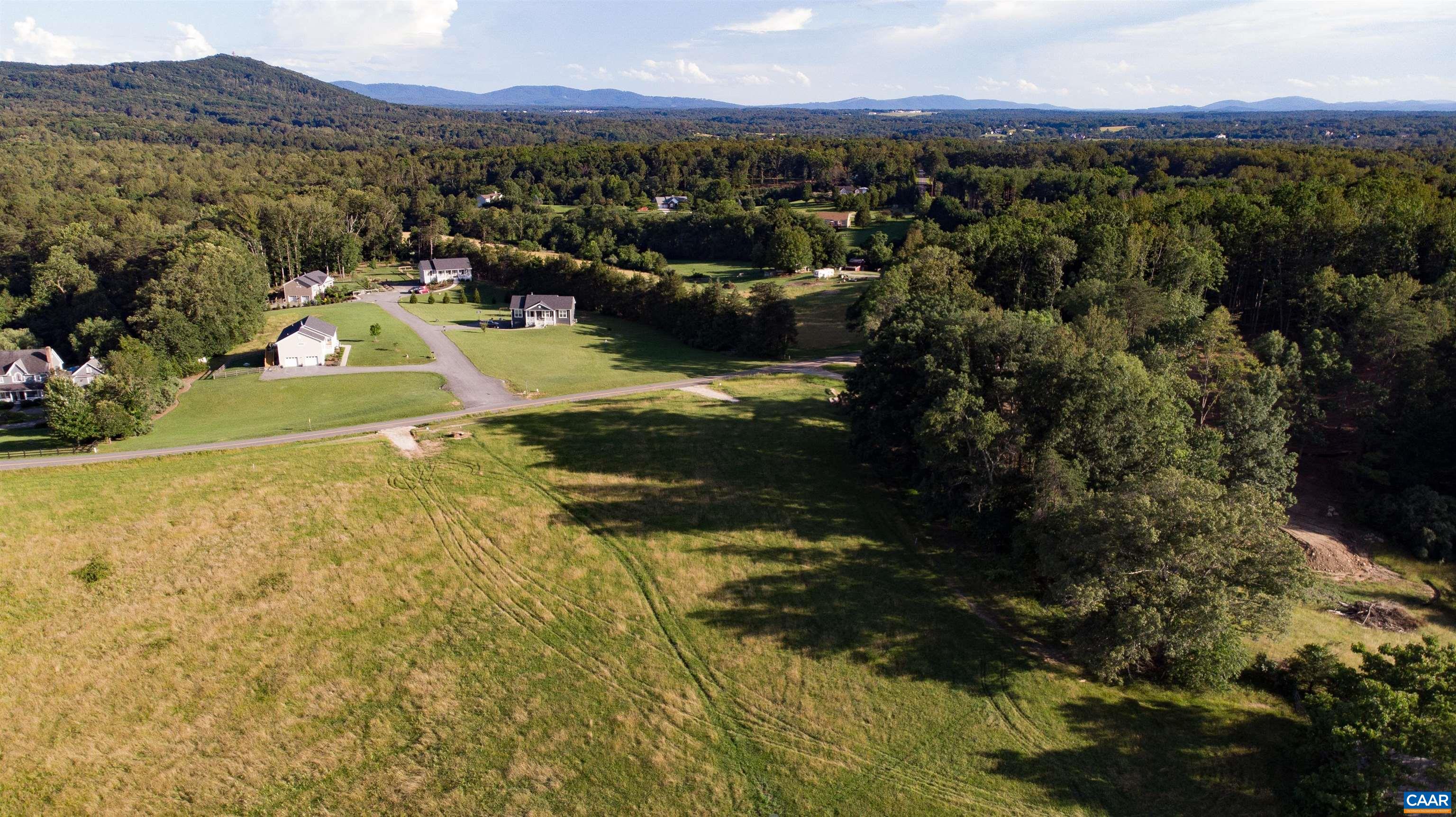 Lot 7 Advance Mills Road Ruckersville, VA 22968 - Photo 20 of 26 a view of a city with mountains in the background