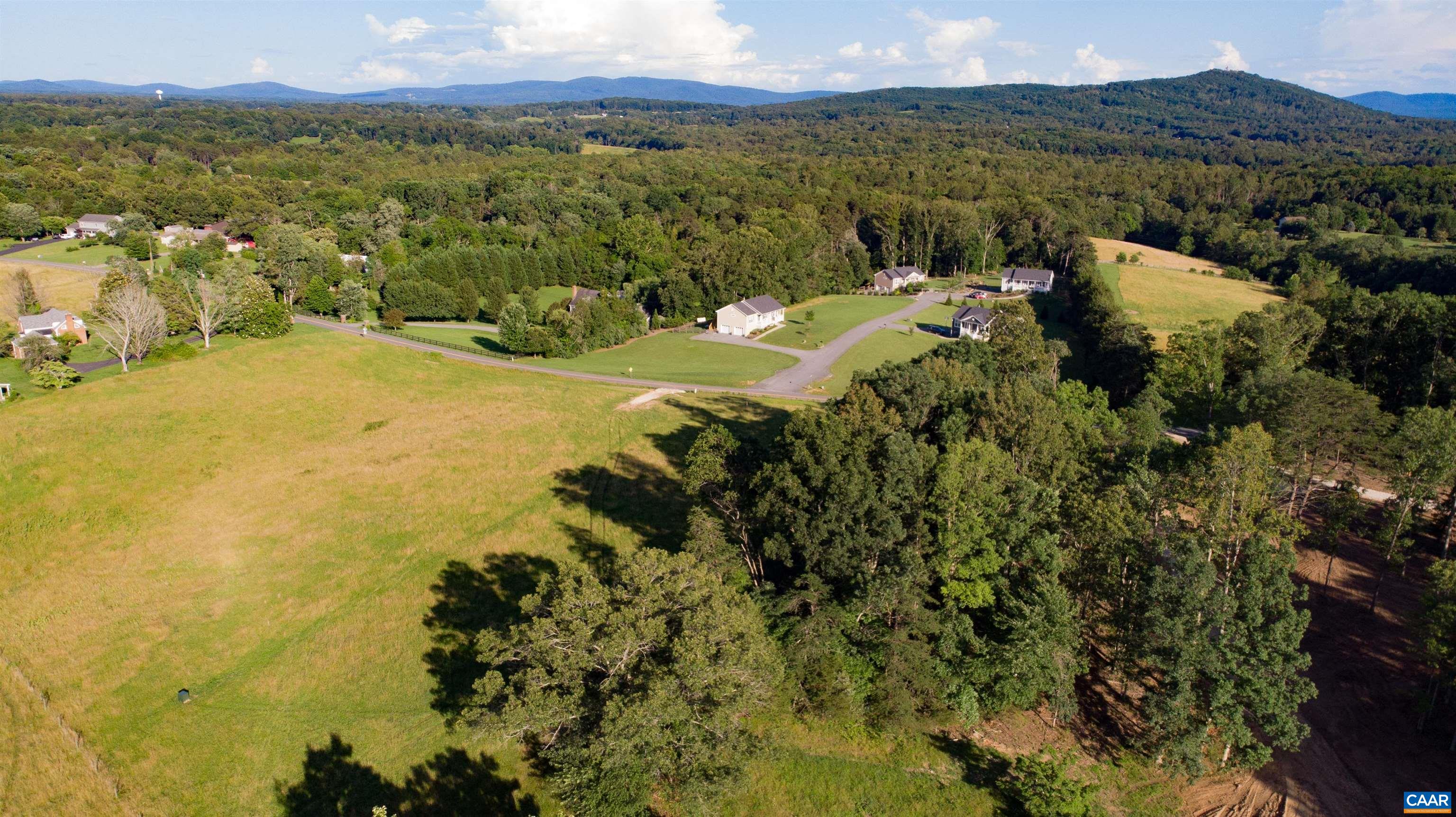 Lot 7 Advance Mills Road Ruckersville, VA 22968 - Photo 21 of 26 a view of a lake with a mountain