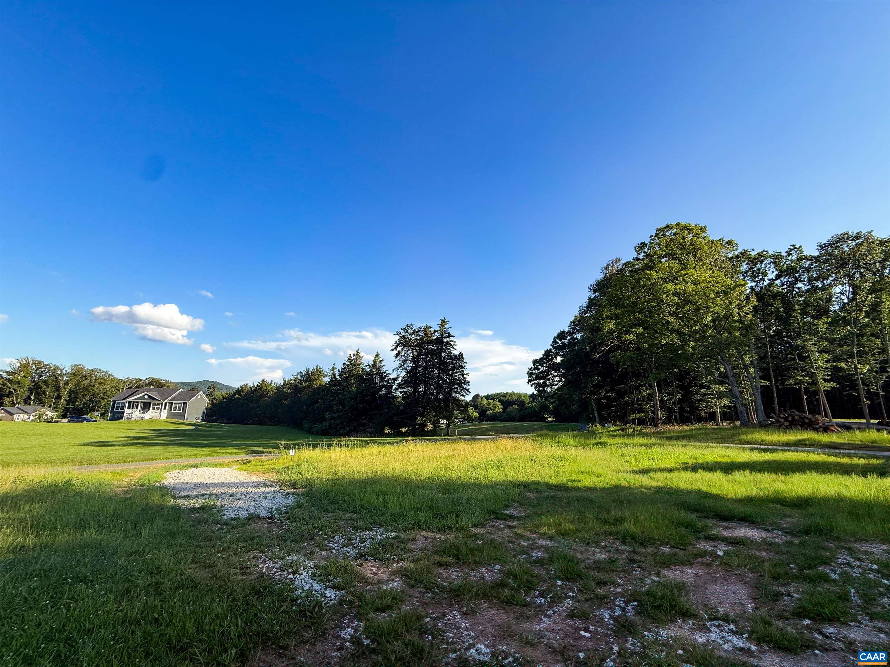 Lot 7 Advance Mills Road Ruckersville, VA 22968 - Photo 26 of 26 a view of a swimming pool and a big yard