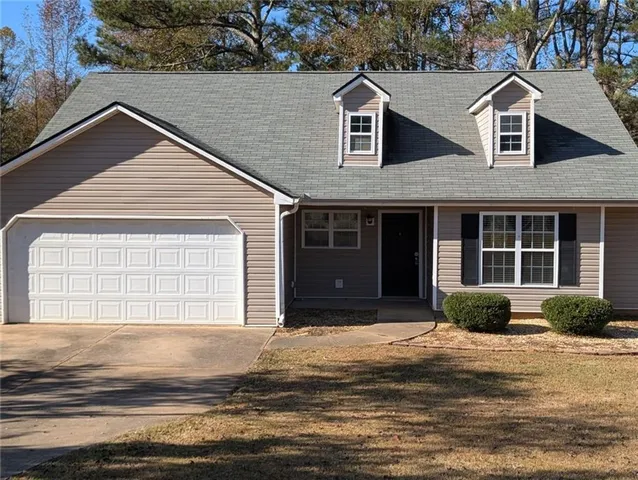 a house view with a outdoor space